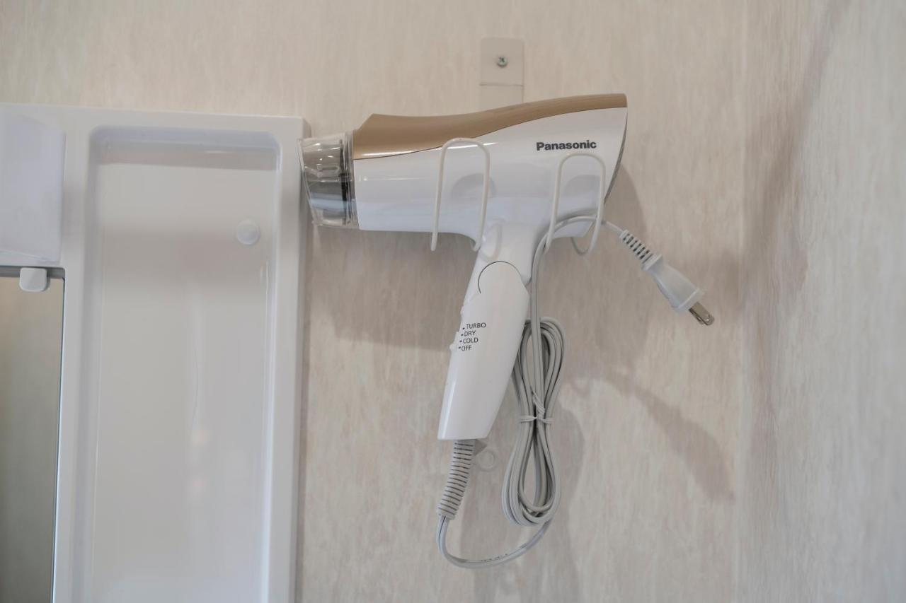 Uhome Suite Kizuna Ikebukuro طوكيو المظهر الخارجي الصورة